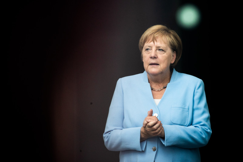 Merkel says EU should use political influence to secure peace in Ukraine